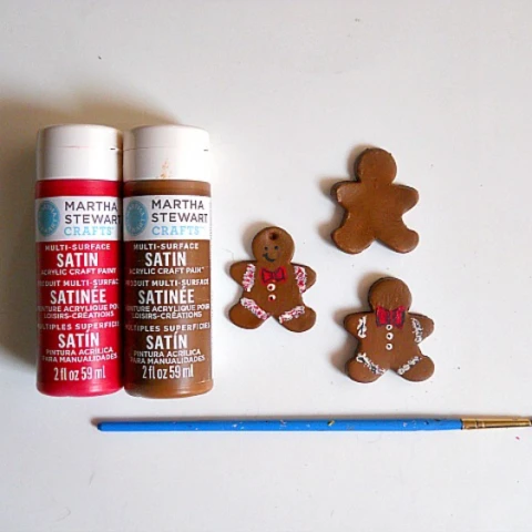 painting the clay ginger bread men